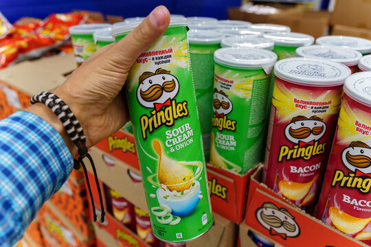 Volzhsky, Russia-September 21, 2021: Pringles chips sour cream. Owned by the Kellogg Company.