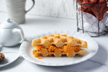 Thai foi thong waffles in white plate and coffee mug snack concept
