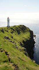 Fototapeta na wymiar Akraberg lighthouse on Suðuroy Island in the Faroe Islands of Denmark.