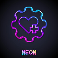 Obraz premium Glowing neon line Heart with a cross icon isolated on black background. First aid. Healthcare, medical and pharmacy sign. Vector