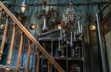 Bangkok, Thailand - Jun 26, 2020 : Interior design and decoration vintage style decorated with old brick wall and wooden staircase, Lamp and Dried flowers. No focus, specifically.
