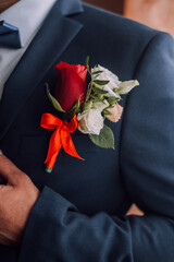 buttonhole on the groom's suit