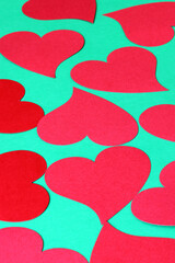 red hearts on a green background