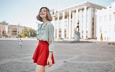 beautiful woman attractive look red lips walk in the park Fresh air