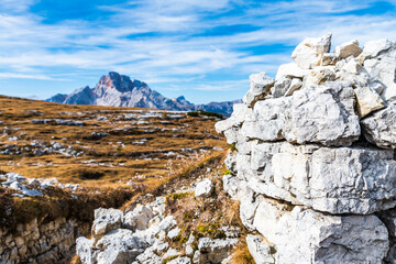Autumn panorama on Monte Piana. View from the trenches to the three peaks of Lavaredo. Dolomites.