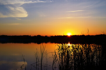 Sunset on the river in summer