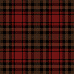 Red, brown and black tartan plaid. Scottish pattern fabric swatch close-up. 