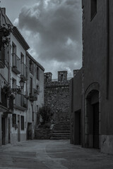Black white picture of the fortified town Montblanc in Tarragona, Catalunya, Spain, vertical