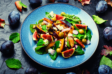 Autumn salad with fruit and green