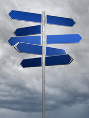 blue directionl signs on a cloudy sky background