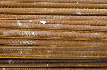 Rusty metal surface. Steel reinforcement.
Armature. Metallurgy. Rust texture.