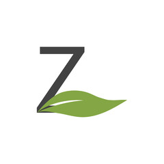 Initial letter with green leaf