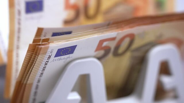Currency financial banknotes counting on a finance counter. Banking equipment for counting cash.