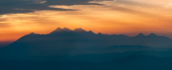 Obraz na płótnie Canvas Dark mountain peaks in the setting sun, Tatra Mountains, Poland