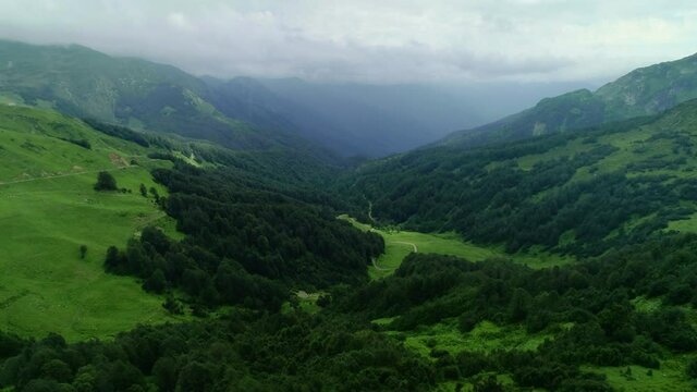 Cinematic aerial shot of an endless mountain and forest landscape in Ancho Pass, Abkhazia, Gagra. 4k uhd