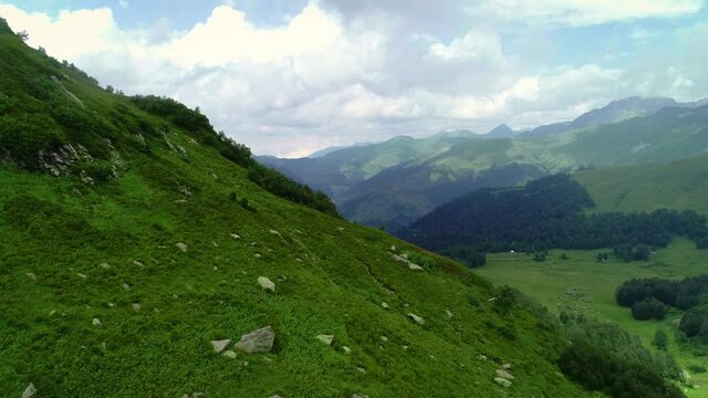 Cinematic aerial shot of an endless mountain and forest landscape in Ancho Pass, Abkhazia, Gagra. 4k uhd
