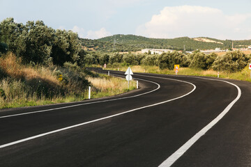 Bending road background on daylight.