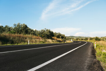 Bending road background on daylight.