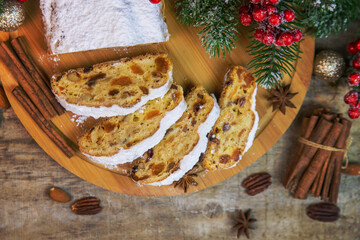 Stollen Christmas cake on the table. Selective focus.