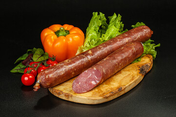 Pork ham sausage cut isolated