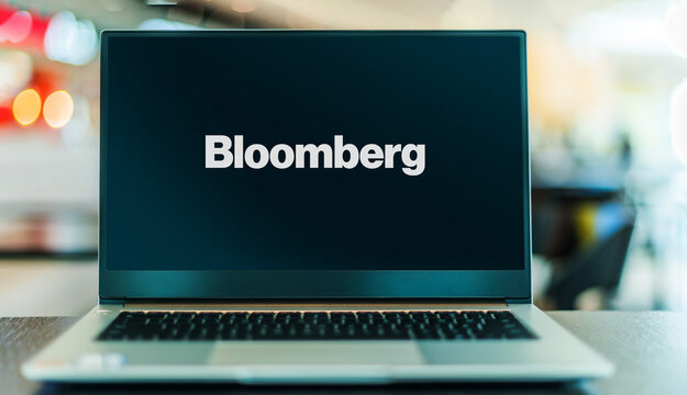 Laptop computer displaying logo of Bloomberg