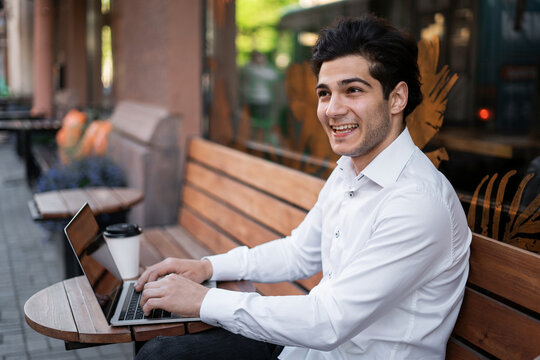 The lawyer responds to clients by email. A banker counts finances online. The manager is working on a laptop near the office on the street.