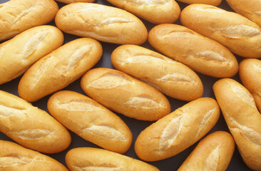 Fresh white bread buns background