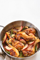 Chicken drumsticks baked with apples