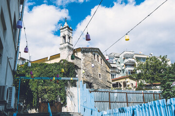 Obraz premium Fatih, Istanbul, Turkey - October 2021: Historical Istanbul streets and church. Aya Mina Greek Orthodox Church. Historical church buildings in Istanbul Samatya. Selective focus.