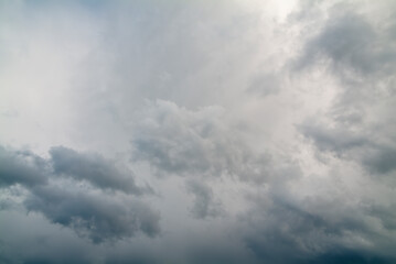Dark and gray clouds formations in the sky. Only sky image, no land.