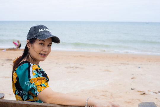 Portrait Of Happy 40 Year Old Woman During Beach Vacation