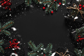 Festive New Year and Christmas composition with fir branches, wrapped presents, red berries and snow flakes. Flat lay, top view, copy space for your text.