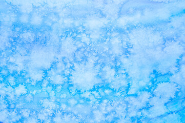 watercolor blue abstract art handmade diy painting on textured paper background. watercolour backdrop. painted frosty ice cold surface with cloud spots