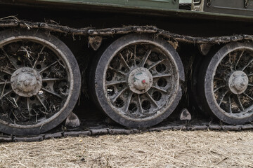 Caterpillar continuous track on army tank, military tracked vehicle.