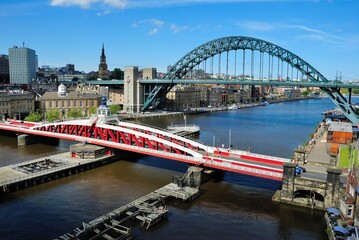 The Tyne Bridge, with Swing and High Level bridges at the back over the River Tyne in North East England, linking Newcastle upon Tyne and Gateshead, England, UK - obrazy, fototapety, plakaty