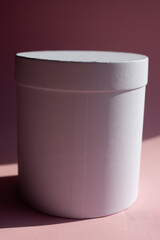 Pink gift box on pink background