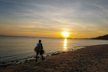 Fisherman and sunset at Koh Phangan 