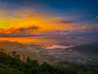 Foto op Canvas sunrise mountains and mist © Arakatak