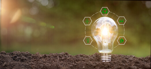 Green energy innovation light bulb with future industry of power generation icon graphic interface....
