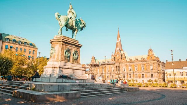 Timelapse view of the town hall in Malmo, Sweden. Stortorget Square and the statue of King Karl X Gustav of Sweden.