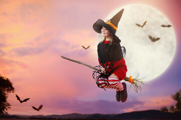 Halloween witch flying broom. Huge moon and bat.