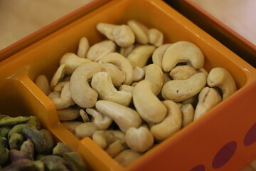 Superior Kaju in Box: Finely Selected Organic Cashews Presented in a Luxurious Package for Exclusive Gifting and Premium Snacking - Distinctive Image