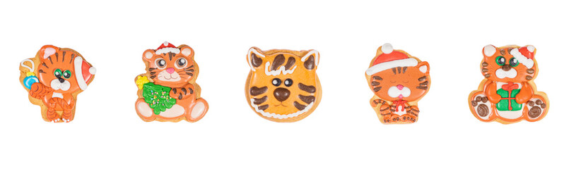 Set of new year homemade gingerbread cookies tiger on the white background.