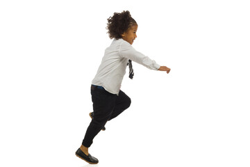 Running small black boy in elegant clothes. Side view. Full length, isolated. - 461883578