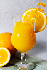 Backgrounf with fresh orange and kiwi juice 