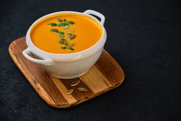 Pumpkin cream soup with and pumpkin seeds
