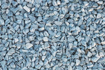 a close up of grey gravel or breakstone