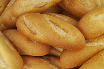 Fresh wheat bread as background