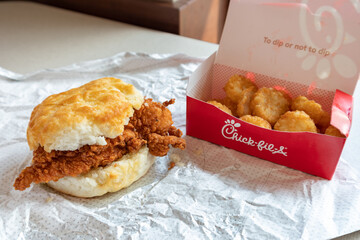 Chick-fil-A Chicken Biscuit Breakfast Sandwich with a Side of Hash Browns on June 10, 2021 in Orland Park, Illinois