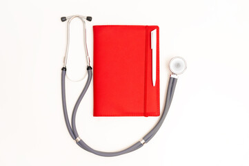 red stethoscope on a white